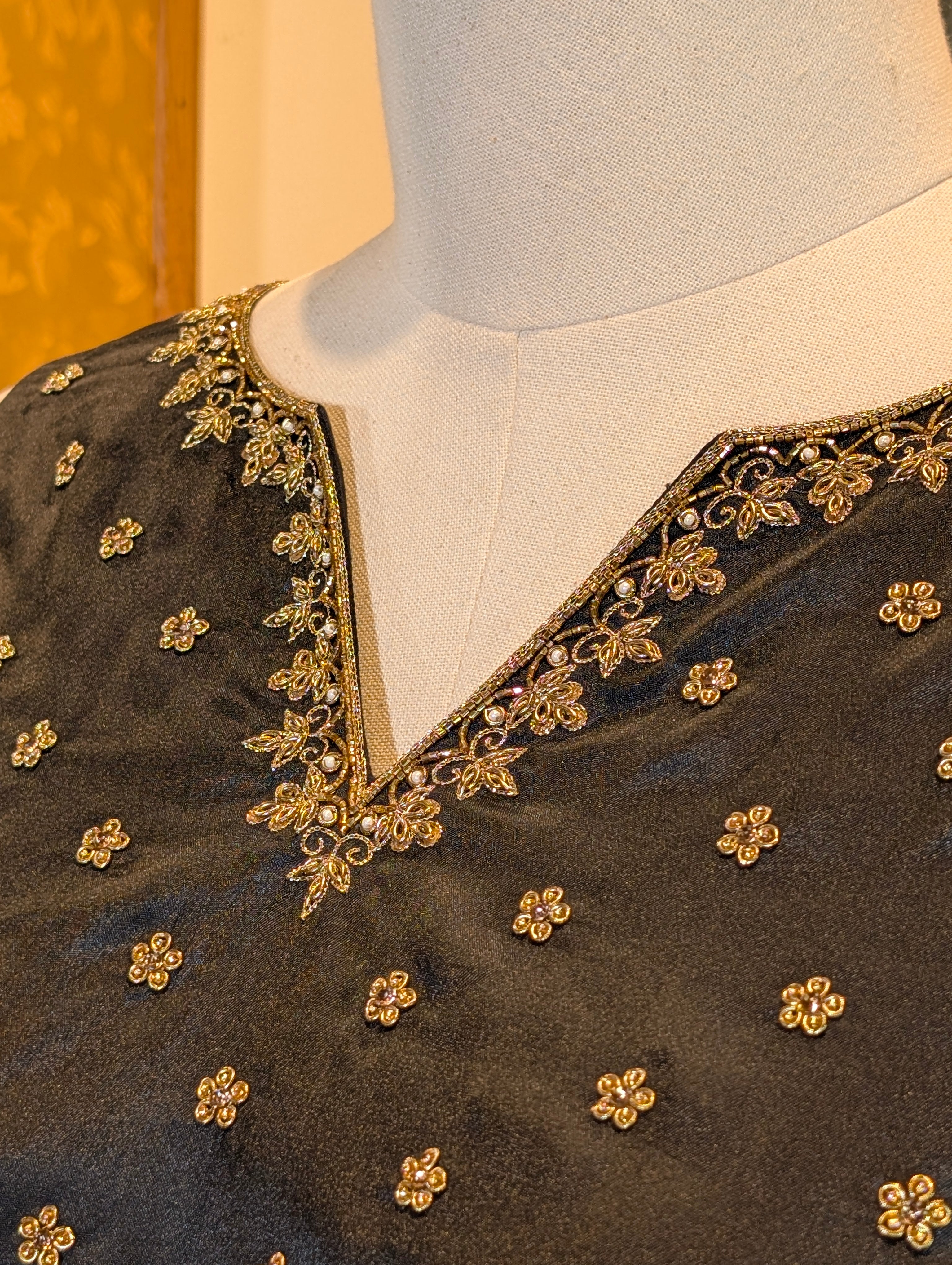 Beige Skirt with Black Leaf Motif Border