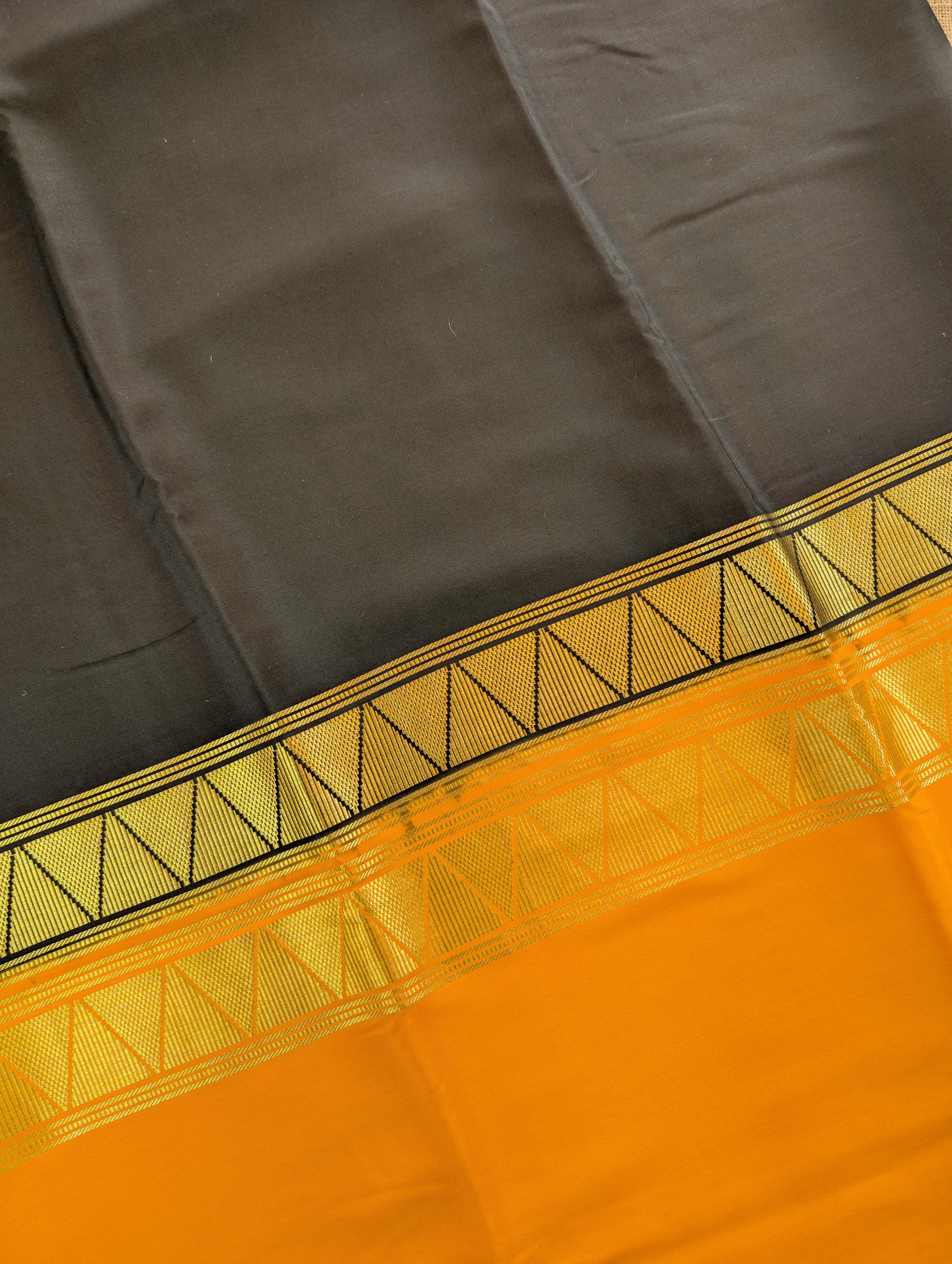 Pure Mysore Silk Crepe - Black with Orange Half & Half Pattern