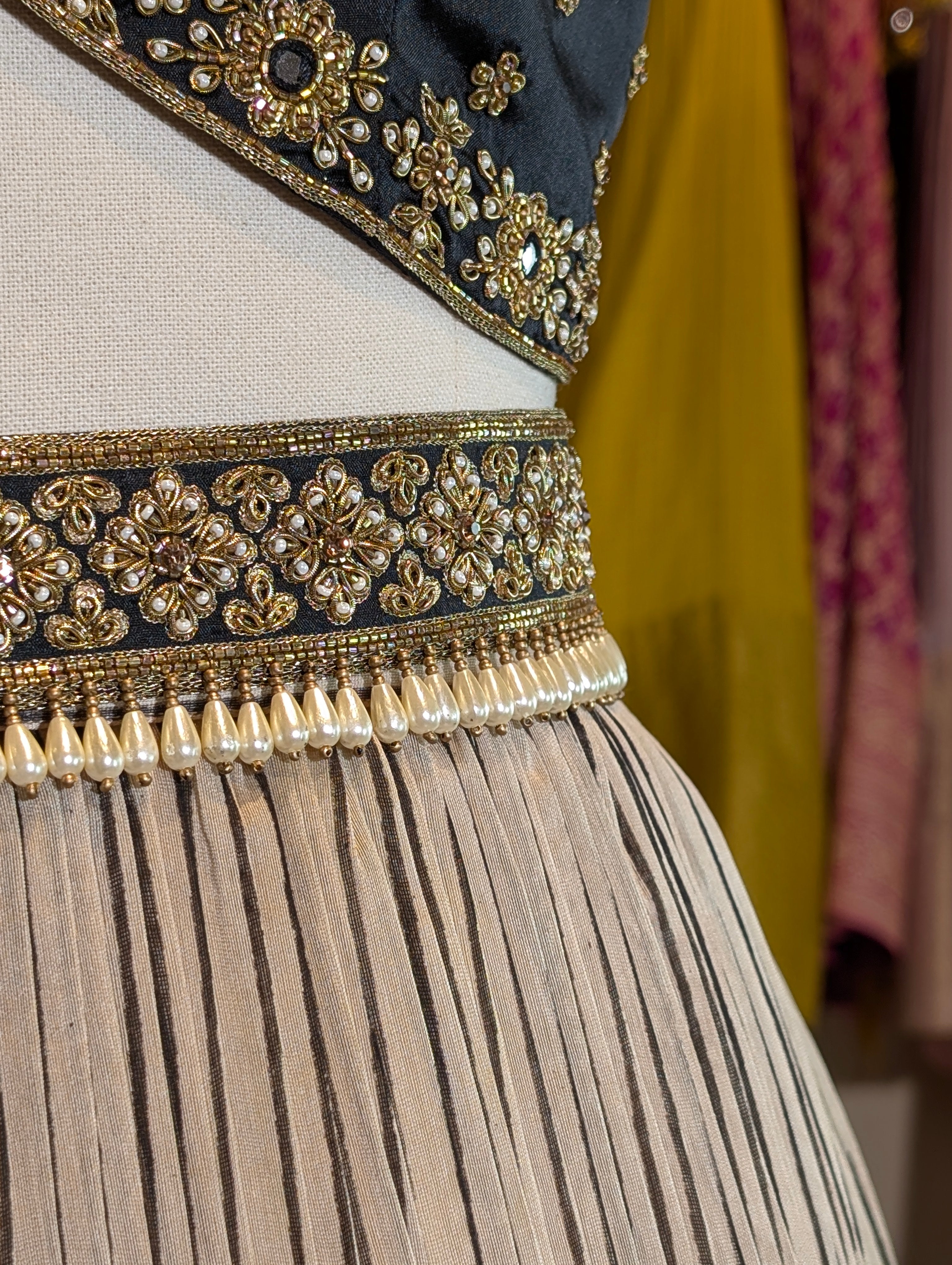 Beige Skirt with Black Leaf Motif Border