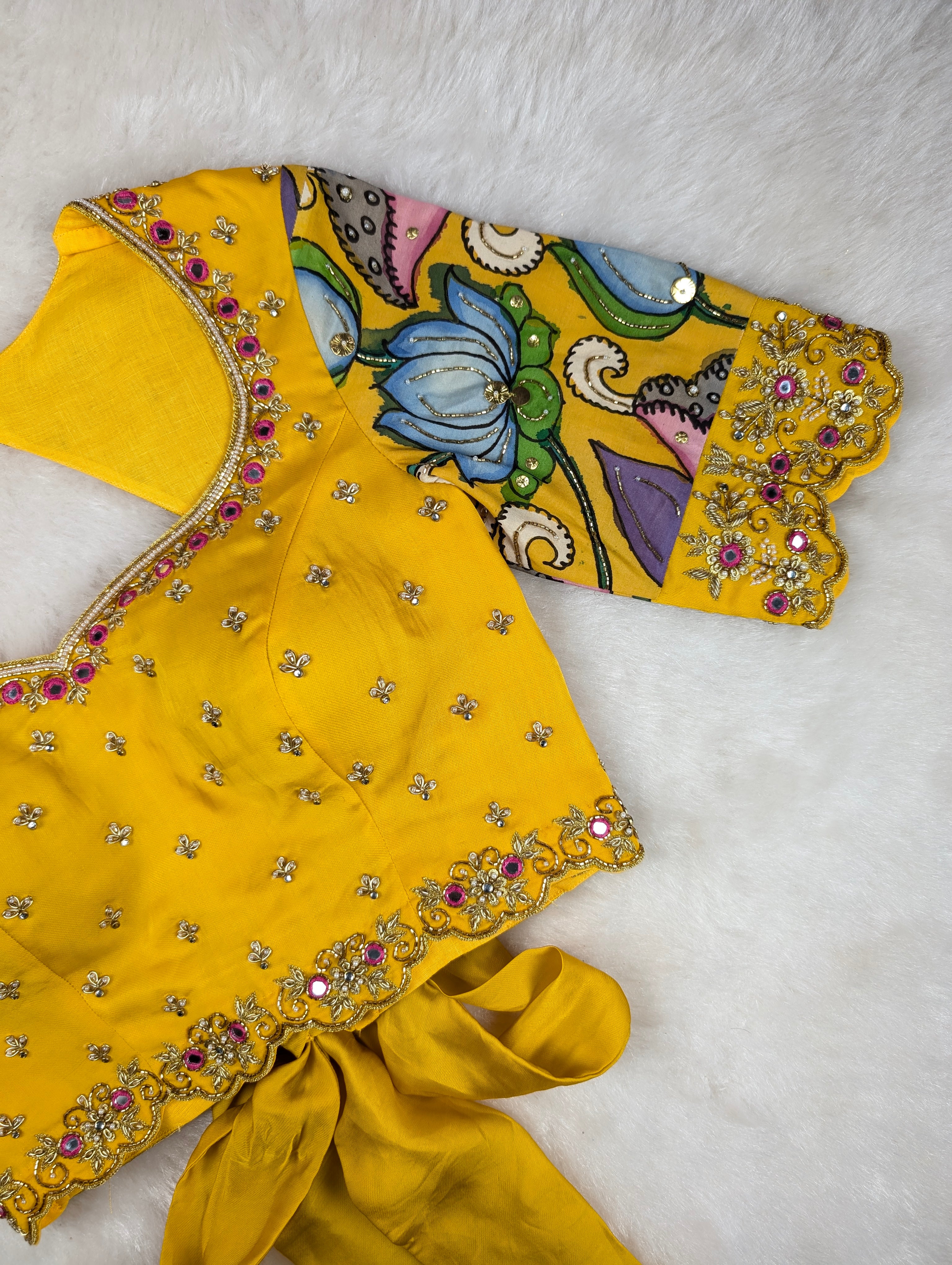 Yellow Hand Embroidered blouse with Pen kalamkari Sleeves