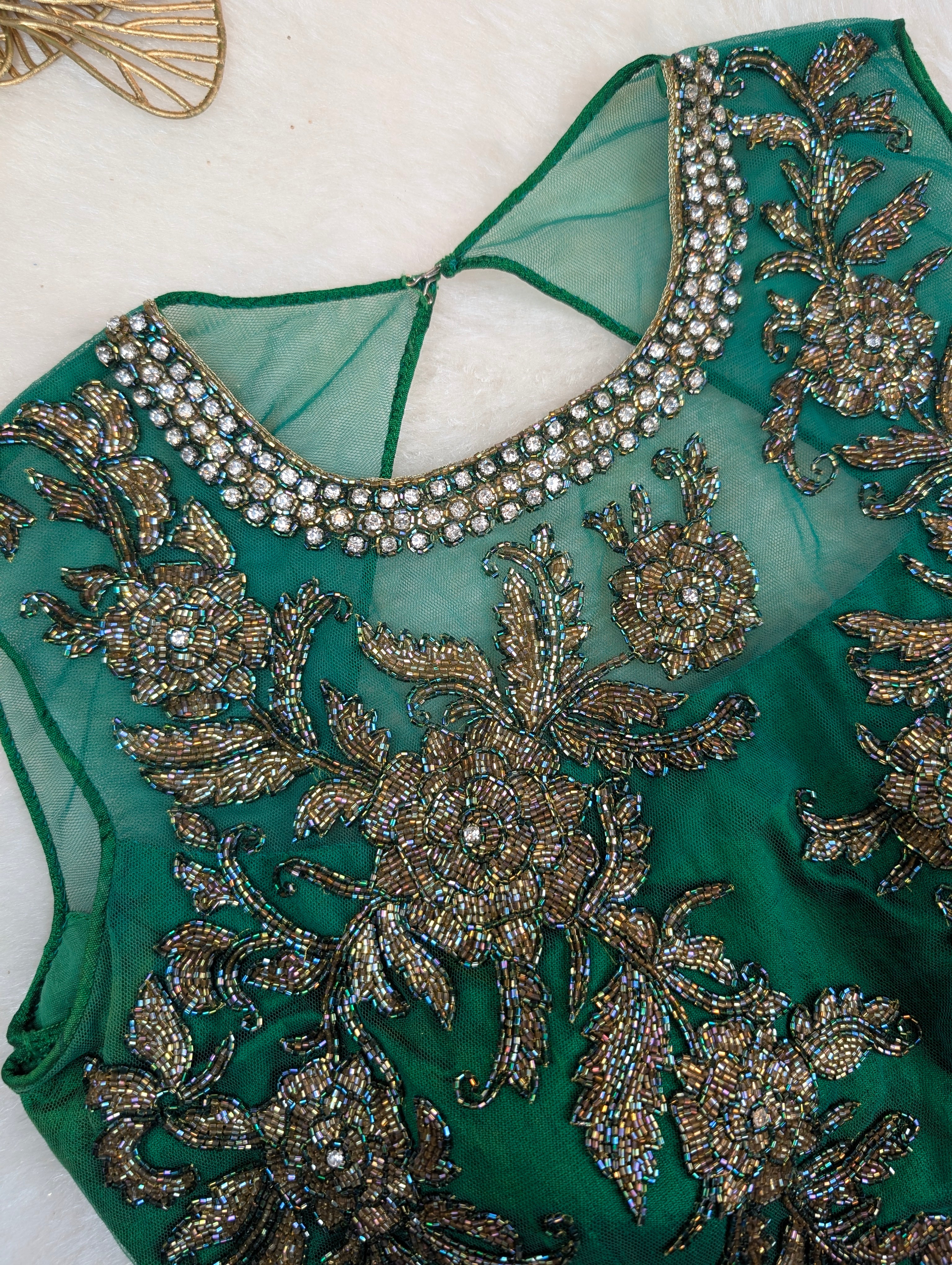 Emerald Green Sleeveless Net-Yoke Embroidered Blouse