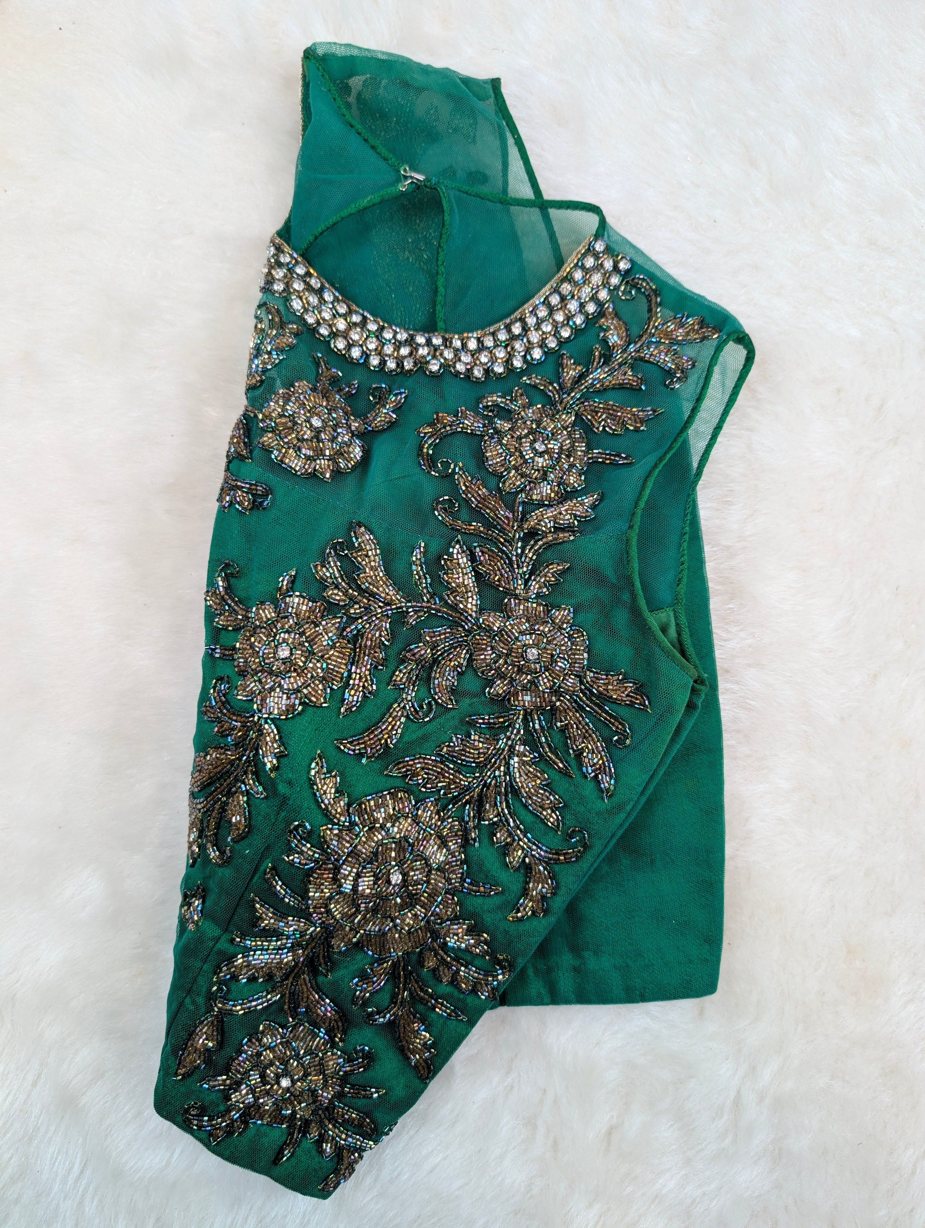 Emerald Green Sleeveless Net-Yoke Embroidered Blouse