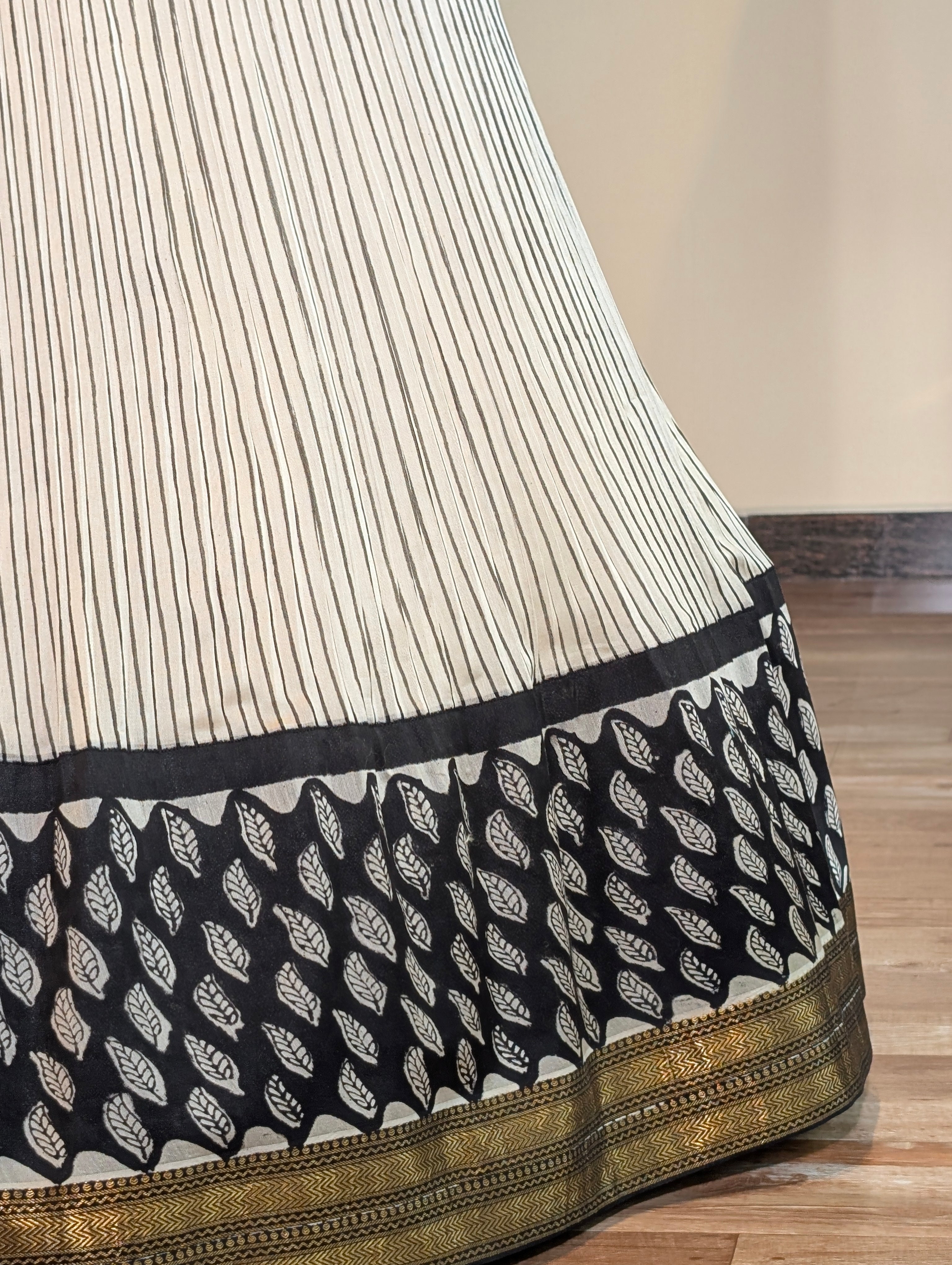 Beige Skirt with Black Leaf Motif Border